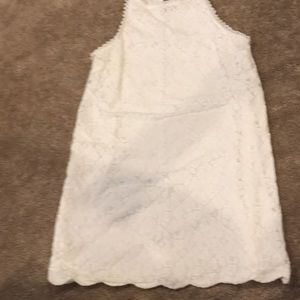 Off white Lacey dress with scalloped bottom detail